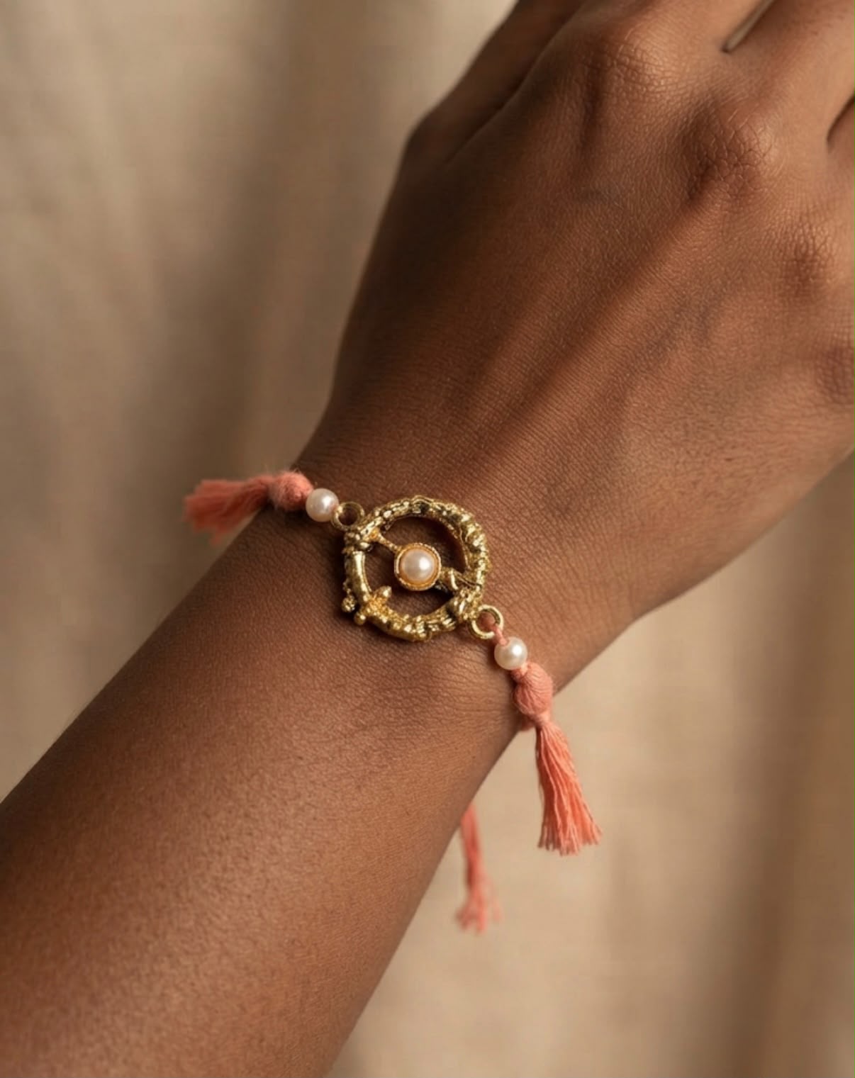 CIRCULAR RAKHI IN GOLD