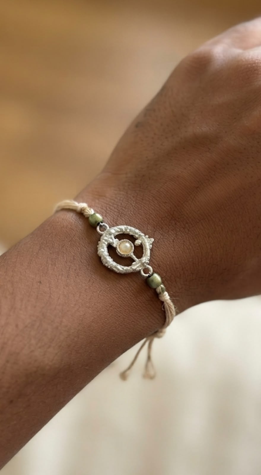 CIRCULAR RAKHI IN SILVER