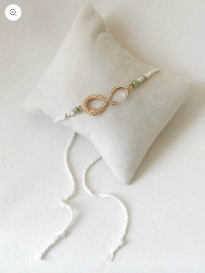 INFINITY RAKHI ROSE AND WHITE