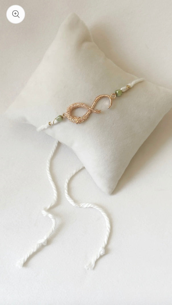 INFINITY RAKHI ROSE AND WHITE