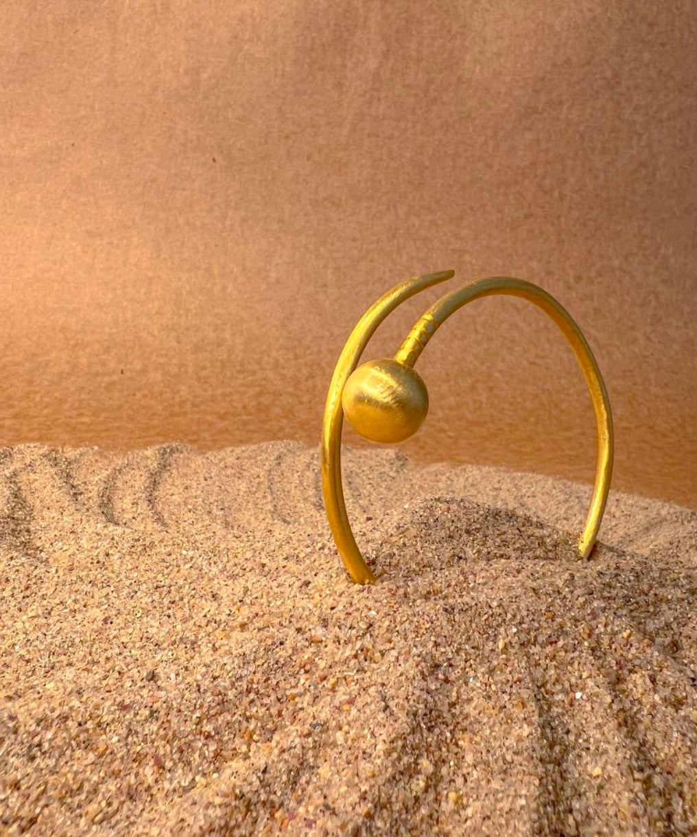 ORB AND NAIL BRACELET
