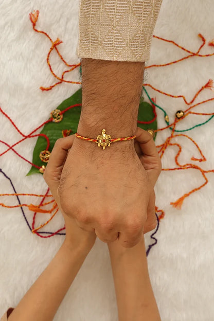 Turtle Rakhi Gold