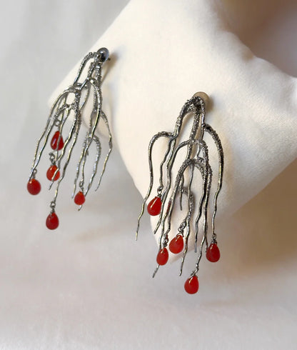 Untamed goddess dangles Black with red onyx