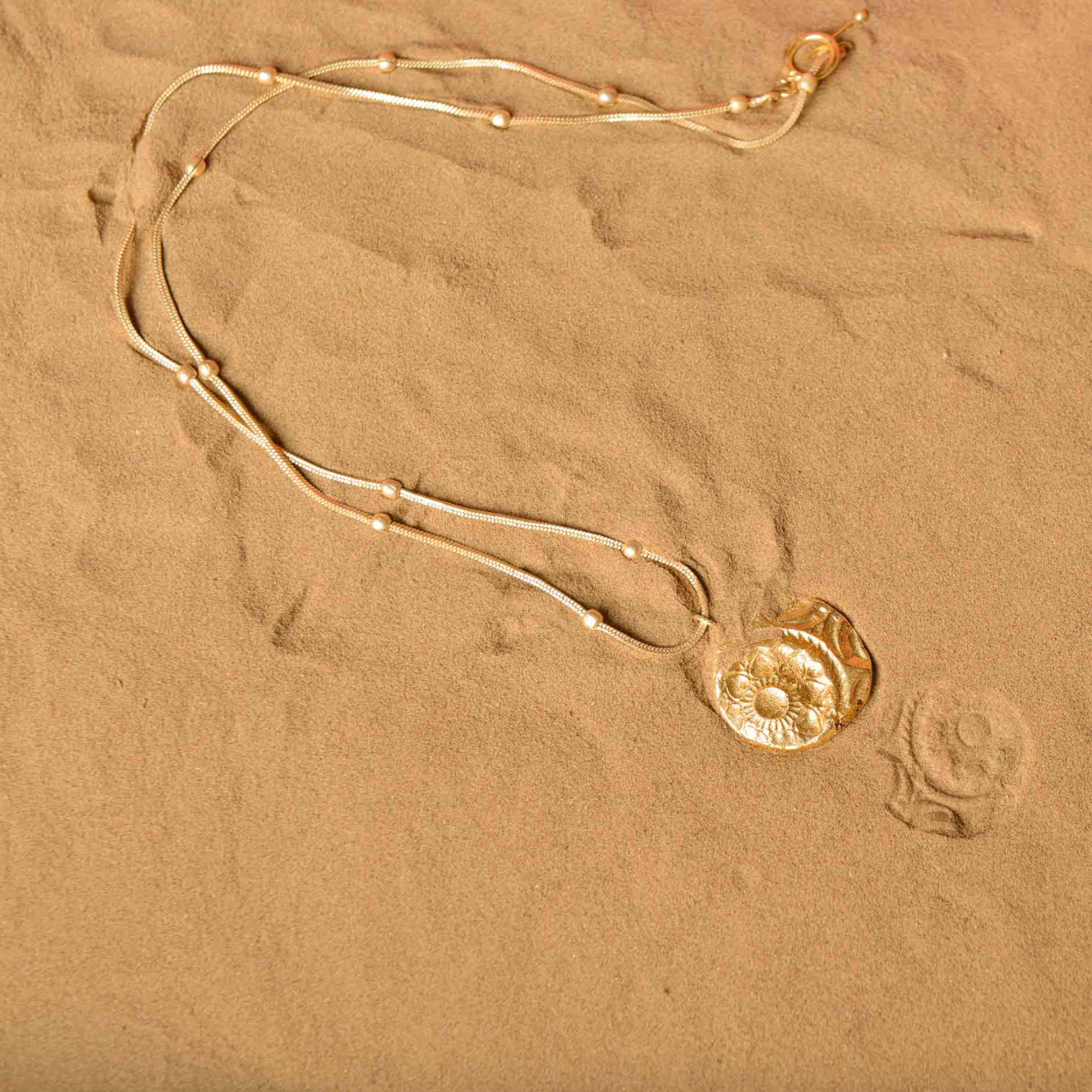 FOSSIL PENDANT M 1